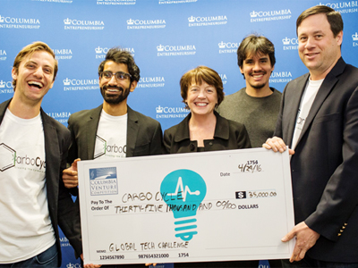 he CarboCycle team poses with Dean Mary C. Boyce.