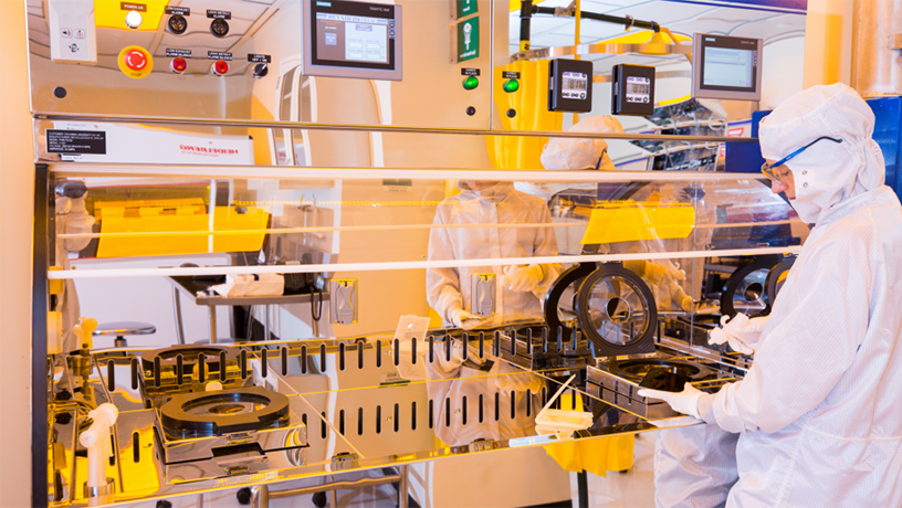 Clean room with researchers in gowns