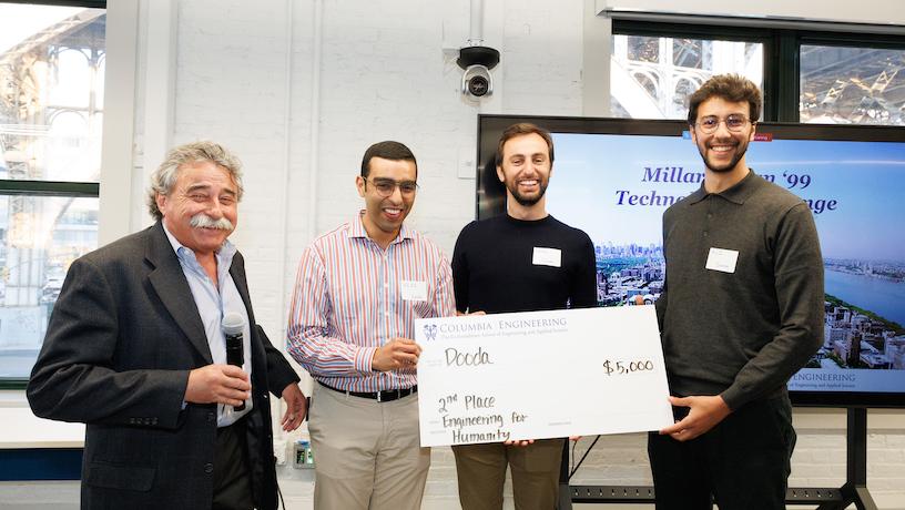 Döoda team leads Ali Abassi, Aziz Kaouech, and Omar Louzir accepting their $5,000 second place Engineering for Humanity Award