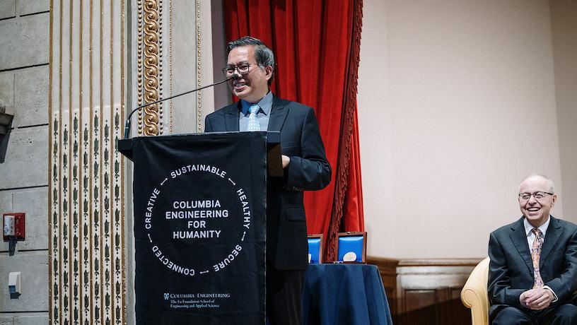 Dean Shih-Fu Chang speaking at the podium