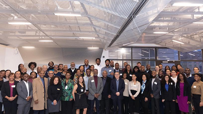 Columbia Engineering Dean Shih-Fu Chang posing for a photo with 47 Columbia NSBE members