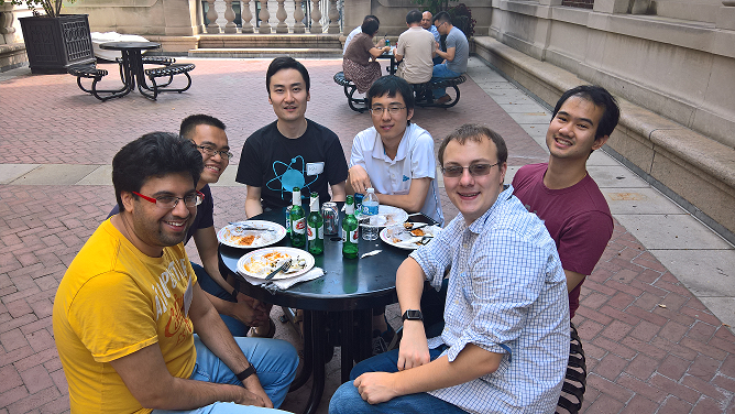 students at table eating